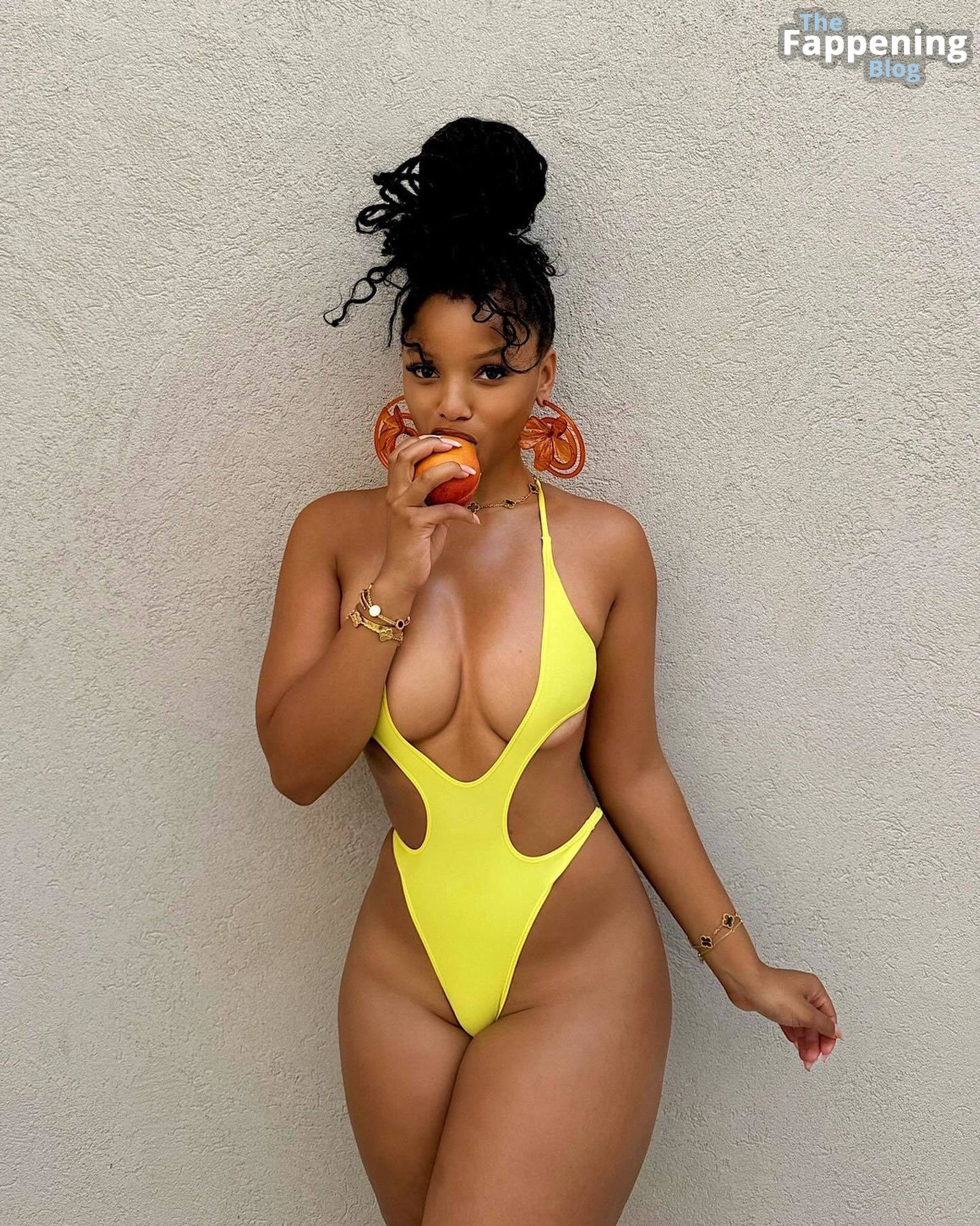 Chloe Bailey Looks Hot in a Yellow Swimsuit (5 Photos)